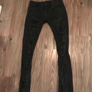 New, never warn ripped jeans size 24